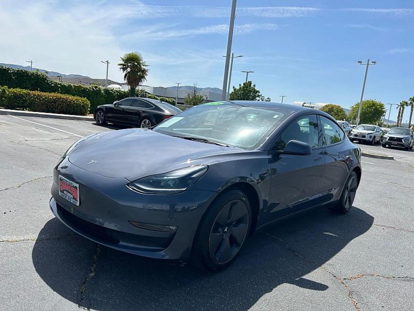 2023 GRAY Tesla Model 3 (5YJ3E1EA2PF) with an AC Electric Motor engine, Single-Speed Fixed Gear transmission, located at 412 Auto Vista Drive, Palmdale, CA, 93551, (661) 945-0620, 34.592636, -118.136681 - Photo#4
