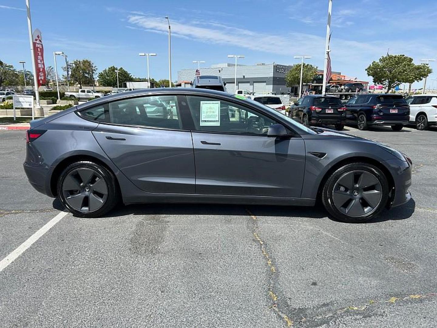 2023 GRAY Tesla Model 3 (5YJ3E1EA2PF) with an AC Electric Motor engine, Single-Speed Fixed Gear transmission, located at 412 Auto Vista Drive, Palmdale, CA, 93551, (661) 945-0620, 34.592636, -118.136681 - Photo#5