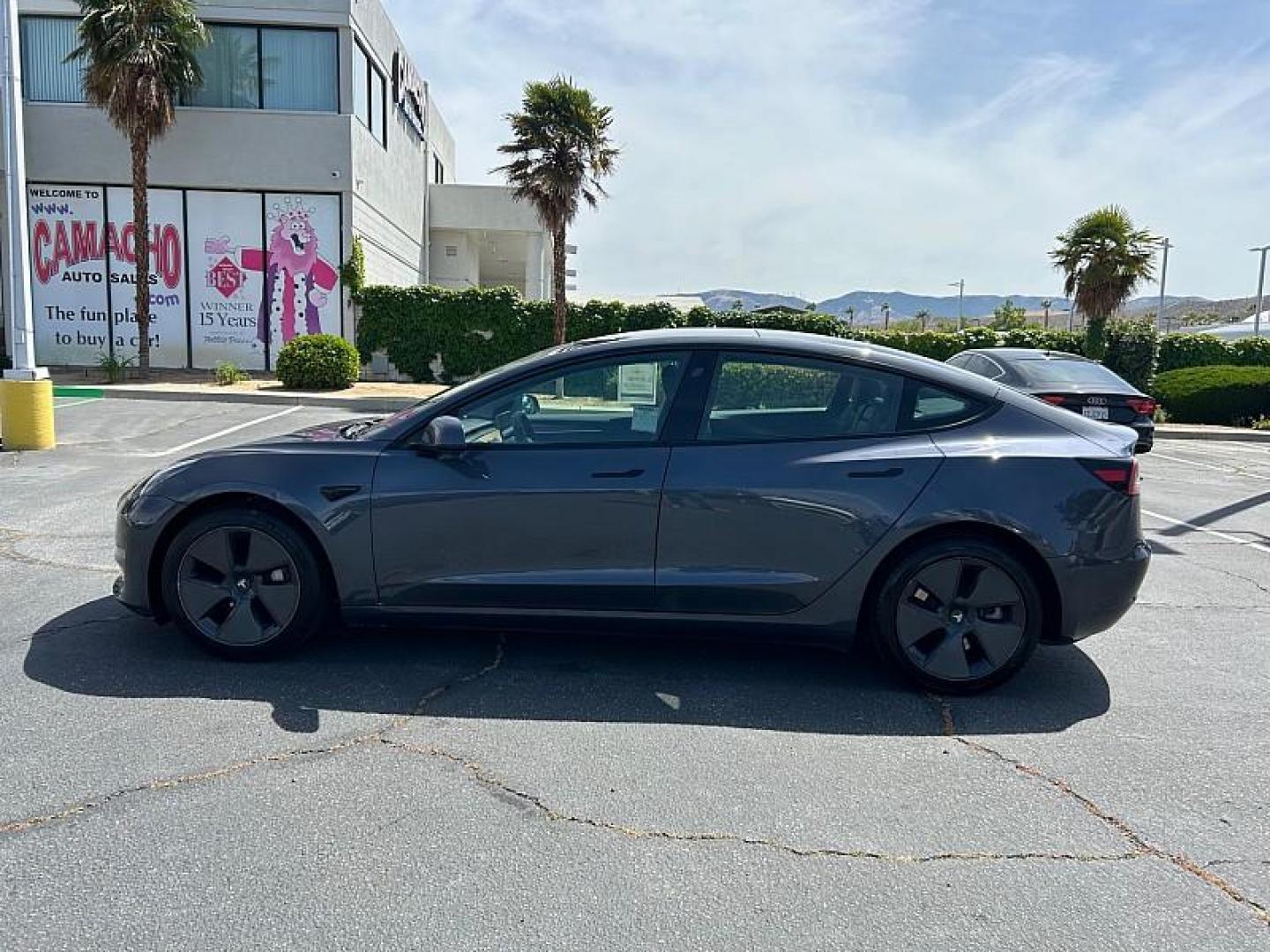 2023 GRAY Tesla Model 3 (5YJ3E1EA2PF) with an AC Electric Motor engine, Single-Speed Fixed Gear transmission, located at 412 Auto Vista Drive, Palmdale, CA, 93551, (661) 945-0620, 34.592636, -118.136681 - Photo#7