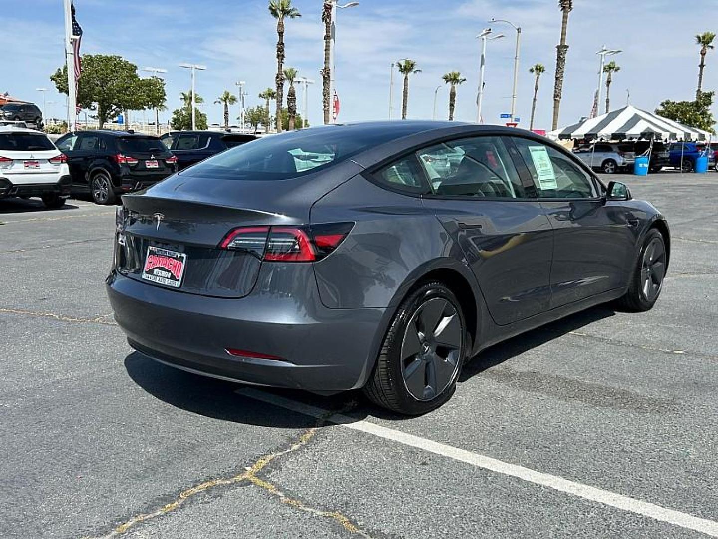 2023 GRAY Tesla Model 3 (5YJ3E1EA2PF) with an AC Electric Motor engine, Single-Speed Fixed Gear transmission, located at 412 Auto Vista Drive, Palmdale, CA, 93551, (661) 945-0620, 34.592636, -118.136681 - Photo#10