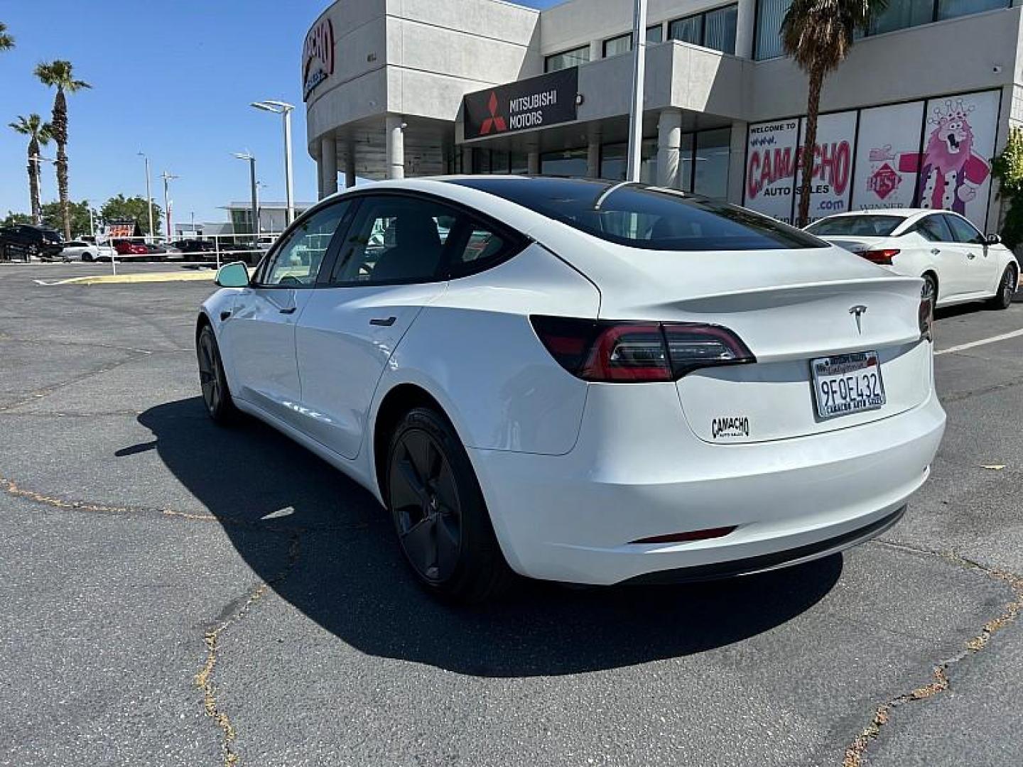 2023 WHITE Tesla Model 3 (5YJ3E1EA5PF) with an AC Electric Motor engine, Single-Speed Fixed Gear transmission, located at 412 Auto Vista Drive, Palmdale, CA, 93551, (661) 945-0620, 34.592636, -118.136681 - Photo#4