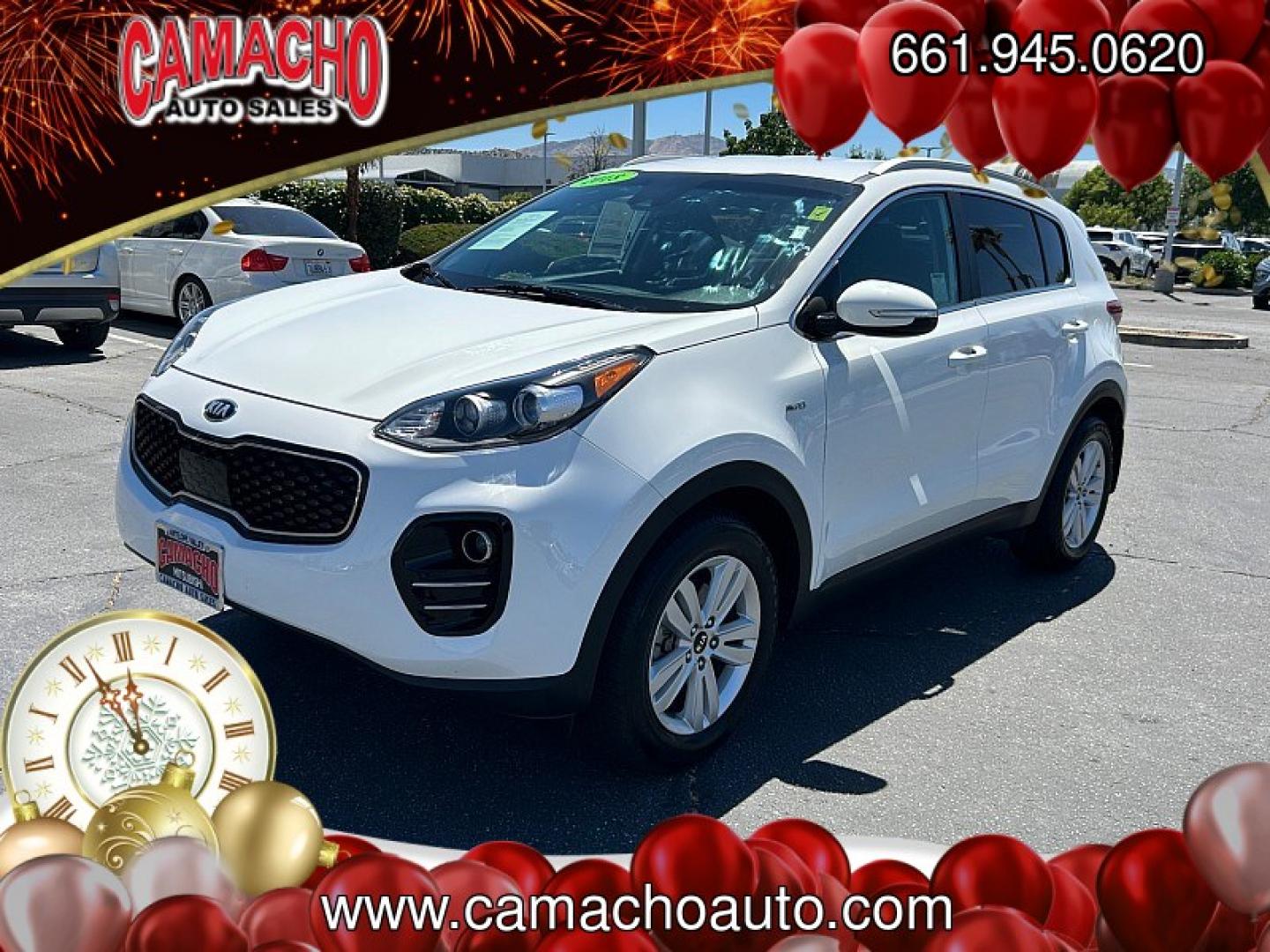 2018 White Kia Sportage (KNDPMCAC9J7) with an 4-Cyl GDI 2.4 Liter engine, Automatic 6-Spd w/Overdrive and Sportmatic transmission, located at 412 Auto Vista Drive, Palmdale, CA, 93551, (661) 945-0620, 34.592636, -118.136681- Photo#2