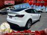 2023 White Tesla Model Y (7SAYGDEE2PF) with an Dual AC Electric Motors engine, Single-Speed Fixed Gear transmission, located at 412 Auto Vista Drive, Palmdale, CA, 93551, (661) 945-0620, 34.592636, -118.136681- Photo#2